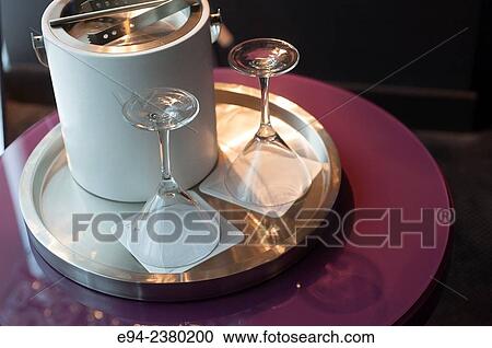 Ice bucket and 2 glasses on a tray on a table. View Large Photo Image Stock Image - Ice bucket and 2 glasses on a tray on a table.. Fotosearch