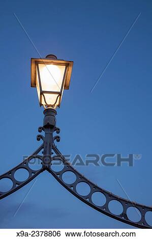 Illuminated Lamp on Ha? Penny Bridge, Dublin, Ireland. View Large Photo Image Stock Photograph - Illuminated Lamp on Ha? Penny Bridge, Dublin, Ireland.. Fotosearch