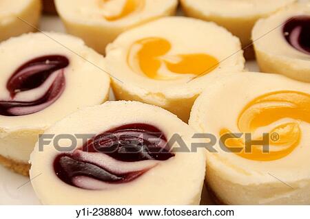 image of small snack size lemon and raspberry cheesecakes. View Large Photo Image Picture - image of small snack size lemon and raspberry cheesecakes.. Fotosearch