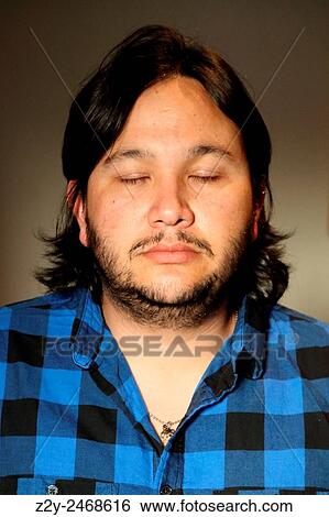 Indigenous man with eyes closed. View Large Photo Image Stock Photograph - Indigenous man with eyes closed.. Fotosearch