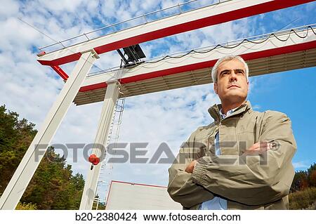 Industrial Engineer. Gantry crane. Industry. Gipuzkoa. Basque Country. Spain. View Large Photo Image Picture - Industrial Engineer. Gantry crane. Industry. Gipuzkoa. Basque Country. Spain.. Fotosearch
