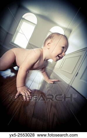 infant boy in an empty room. View Large Photo Image Stock Photo - infant boy in an empty room.. Fotosearch