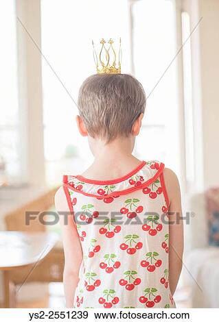 Little girl playing princess at home in living room. Concept of childhood, aspirations and innocence. View Large Photo Image Stock Photo - Little girl playing princess at home in living room. Concept of childhood, aspirations and innocence.. Fotosearch