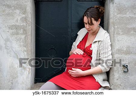 Middel-aged woman, expecting her first child, after being pregnant for 38 weeks. View Large Photo Image Stock Photo - Middel-aged woman, expecting her first child, after being pregnant for 38 weeks.. Fotosearch