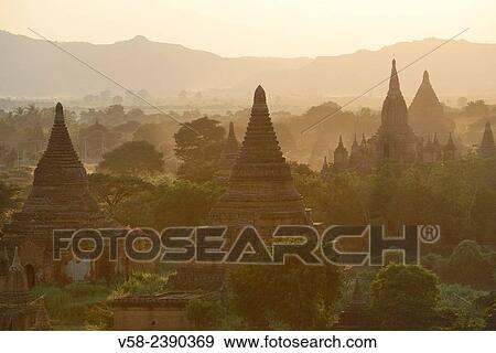 Myanmar, Bagan, Sunset from the top of Shwesandaw pagoda. View Large Photo Image Stock Photo - Myanmar, Bagan, Sunset from the top of Shwesandaw pagoda.. Fotosearch