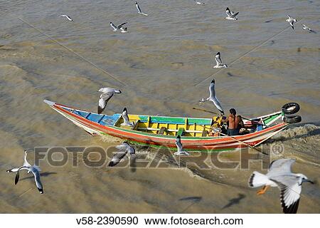 Myanmar, Yangon (Rangoon), Cruising up Yangon river. View Large Photo Image Stock Image - Myanmar, Yangon (Rangoon), Cruising up Yangon river.. Fotosearch