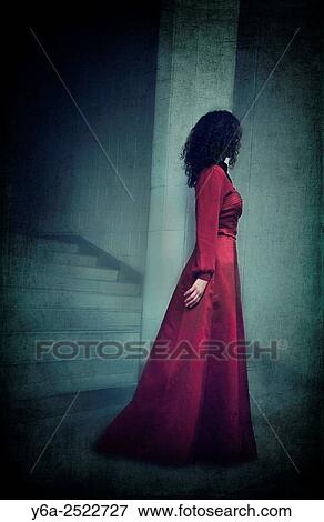 Stock Photo - Mysterious woman in red dress.. Fotosearch