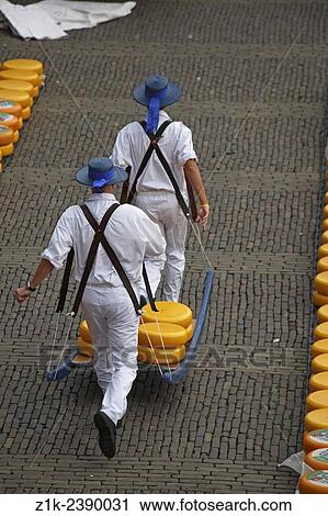 Stock Image - Netherlands. Alkmaar Cheese Market Kaasmarkt.. Fotosearch