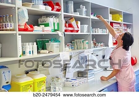 Picture - Nurse preparing medication, Nursing control, Plant hospitalization, Hospital Donostia, San Sebastian, Gipuzkoa, Basque Country, Spain. Fotosearch