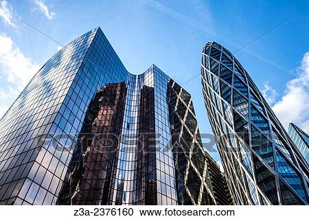 Stock Image - Office skyscrapers in La D? fense, the high-rise business district west of Paris, France.. Fotosearch