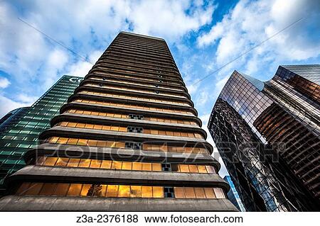 Stock Photo - Office skyscrapers in La D? fense, the high-rise business district west of Paris, France.. Fotosearch