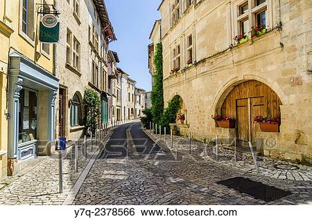 Old cobbled street in the Medieval town of Saint-Macaire, Gironde, France. View Large Photo Image Stock Photograph - Old cobbled street in the Medieval town of Saint-Macaire, Gironde, France.. Fotosearch