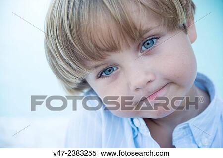 Portrait of a boy with blue eyes View Large Photo Image Stock Photography - Portrait of a boy with blue eyes. Fotosearch