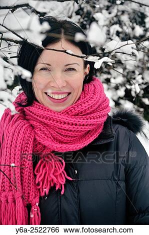 Portrait of a smiling mid adult woman. View Large Photo Image Stock Photograph - Portrait of a smiling mid adult woman.. Fotosearch