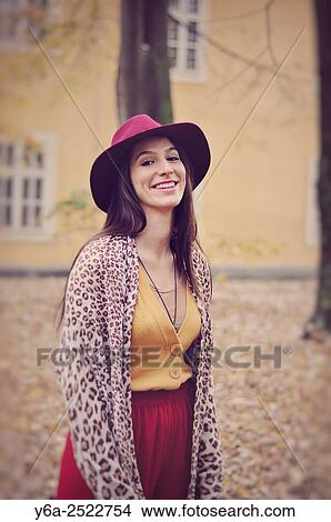 Portrait of a smiling young woman. View Large Photo Image Picture - Portrait of a smiling young woman.. Fotosearch