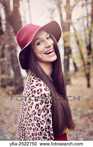 Portrait of a smiling young woman. View Large Photo Image Stock Image - Portrait of a smiling young woman.. Fotosearch