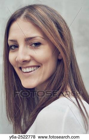 Portrait of a smiling young woman. View Large Photo Image Stock Photo - Portrait of a smiling young woman.. Fotosearch