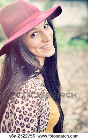 Portrait of a smiling young woman. View Large Photo Image Stock Photograph - Portrait of a smiling young woman.. Fotosearch
