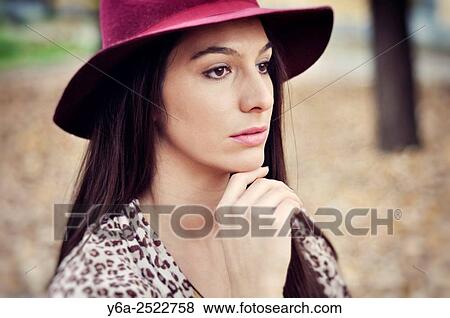 Portrait of a thoughtful young woman. View Large Photo Image Stock Photo - Portrait of a thoughtful young woman.. Fotosearch