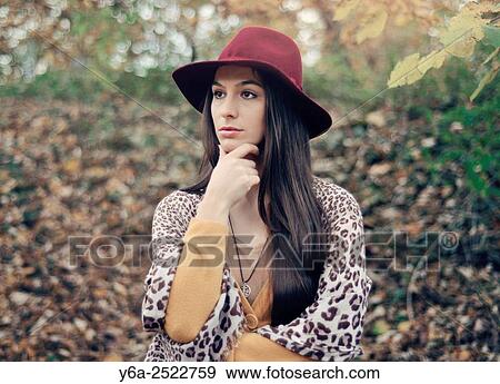 Portrait of a thoughtful young woman. View Large Photo Image Stock Photo - Portrait of a thoughtful young woman.. Fotosearch