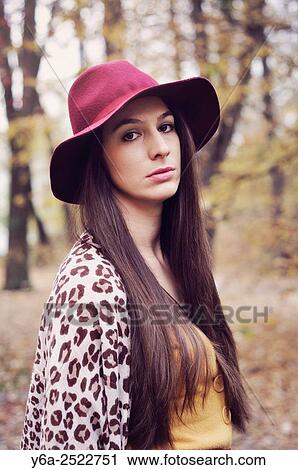 Stock Image - Portrait of a young woman.. Fotosearch
