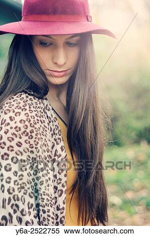 Stock Photography - Portrait of a young woman.. Fotosearch