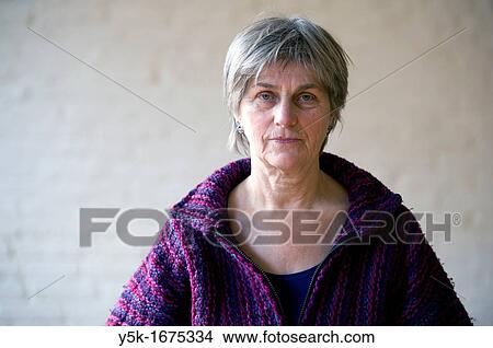 Portrait of an elder woman after her daily meditation. View Large Photo Image Picture - Portrait of an elder woman after her daily meditation.. Fotosearch