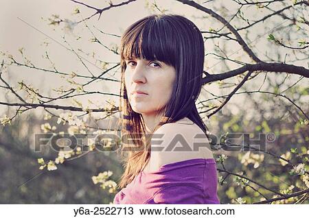 Portrait of mid adult woman, spring View Large Photo Image Stock Image - Portrait of mid adult woman, spring. Fotosearch