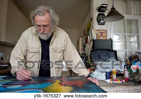 Stock Photo - Portrait of the 72 year old Gerard, who is still actively working as a spiritual coach, painter and researcher.. Fotosearch