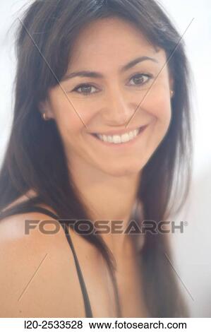 Portrait of woman, smiling View Large Photo Image Stock Photo - Portrait of woman, smiling. Fotosearch