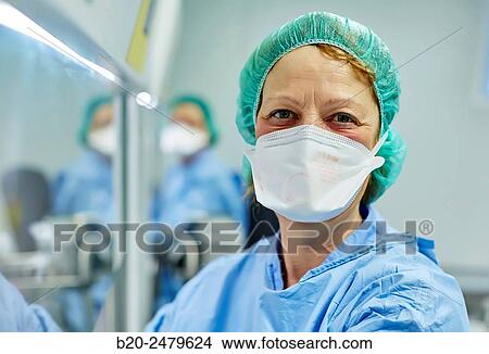 Picture - Preparation of drugs in laminar flow hood, epidural anesthesia, Clean room, Pharmacy, Hospital Donostia, San Sebastian, Gipuzkoa, Basque Country, Spain. Fotosearch