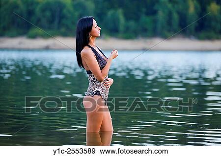 Pretty young woman in nature. View Large Photo Image Stock Photo - Pretty young woman in nature.. Fotosearch