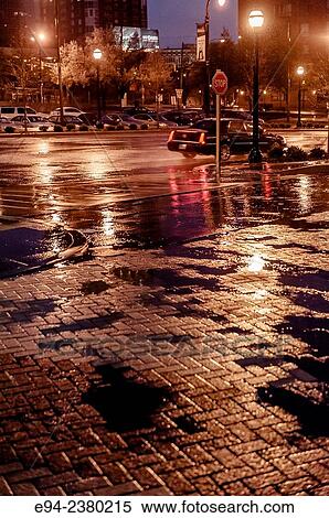 Rainy street scene with reflections on pavement, early morning, Atlanta. View Large Photo Image Stock Photography - Rainy street scene with reflections on pavement, early morning, Atlanta.. Fotosearch