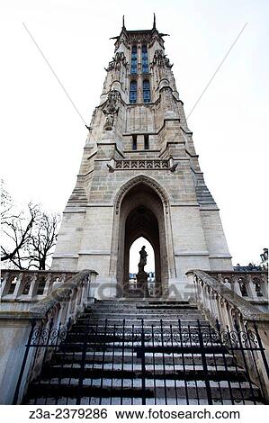 Stock Photograph - Saint-Jacques Tower (Tour Saint-Jacques) is a monument located in the 4th arrondissement of Paris, France, on Rue de Rivoli at Rue Nicolas Flamel.. Fotosearch