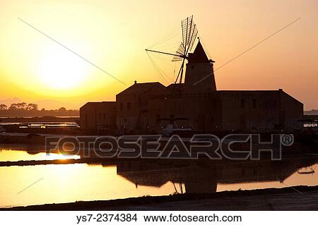 Saltworks and the picturesque windmills at the Stagnone lagoon, Marsala, Sicily, Italy, Europe. View Large Photo Image Picture - Saltworks and the picturesque windmills at the Stagnone lagoon, Marsala, Sicily, Italy, Europe.. Fotosearch