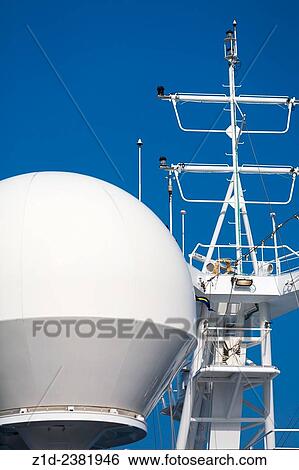 satellite communications dishes protected from the elements on board ship View Large Photo Image Stock Photograph - satellite communications dishes protected from the elements on board ship. Fotosearch