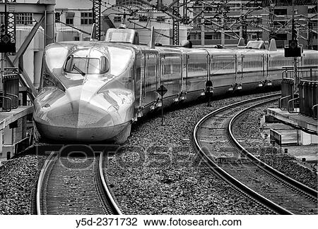 Shinkansen arriving from Okayama to Shin-Osaka train station, Japan. View Large Photo Image Stock Image - Shinkansen arriving from Okayama to Shin-Osaka train station, Japan.. Fotosearch