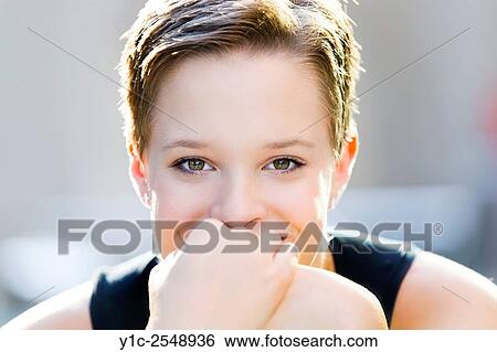 Stock Photograph - Short-haired teengirl portrait.. Fotosearch