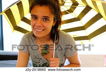 Smily woman with yellow and black umbrella. View Large Photo Image Stock Image - Smily woman with yellow and black umbrella.. Fotosearch