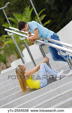 Stock Photo - Teen couple girl and boy teasing each other View Large Photo Image Stock Photo - Stock Photo - Teen couple girl and boy teasing each other. Fotosearch