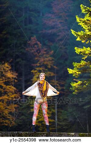 Stock Photo - Teenager girl is pretending to fly View Large Photo Image Stock Photo - Stock Photo - Teenager girl is pretending to fly. Fotosearch