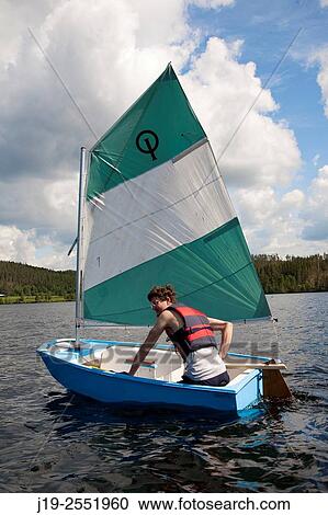 Stock Image - Summer cottage holiday brothers, J? mtland, Sweden brothers boat ride, sailing. Fotosearch