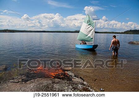 Summer cottage holiday brothers, J? mtland, Sweden brothers boat ride, sailing View Large Photo Image Stock Image - Summer cottage holiday brothers, J? mtland, Sweden brothers boat ride, sailing. Fotosearch