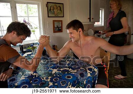 Summer cottage holiday brothers, J? mtland, Sweden arm wrestle View Large Photo Image Stock Image - Summer cottage holiday brothers, J? mtland, Sweden arm wrestle. Fotosearch
