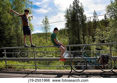 Stock Photograph - Summer cottage holiday brothers, J? mtland, Sweden brother, bike ride. Fotosearch