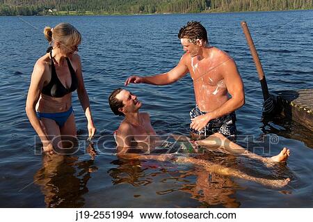 Summer cottage holiday J? mtland Sweden family bath, swimming View Large Photo Image Picture - Summer cottage holiday J? mtland Sweden family bath, swimming. Fotosearch