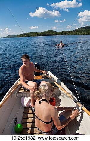 Summer cottage holiday J? mtland Sweden family bath, swimming. boat ride View Large Photo Image Stock Image - Summer cottage holiday J? mtland Sweden family bath, swimming. boat ride. Fotosearch