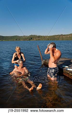 Summer cottage holiday J? mtland Sweden family bath, swimming View Large Photo Image Stock Image - Summer cottage holiday J? mtland Sweden family bath, swimming. Fotosearch