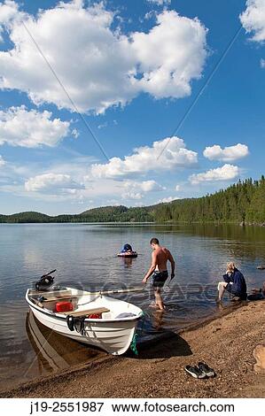 Summer cottage holiday J? mtland Sweden family bath, swimming, boat ride View Large Photo Image Stock Photo - Summer cottage holiday J? mtland Sweden family bath, swimming, boat ride. Fotosearch