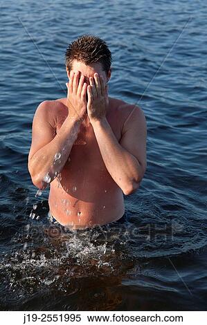 Stock Photography - Summer cottage holiday J? mtland Sweden family bath, swimming. Fotosearch